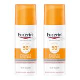 Abbildung: Eucerin Sun Fluid Pigment Control LSF 50 + Creme, 2x50 ml PZN 08032297